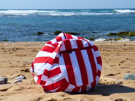 Coussin de plage rayé rouge et blanc avec anse