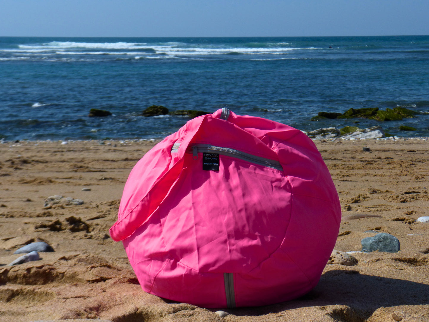 Coussin de plage rose avec anse